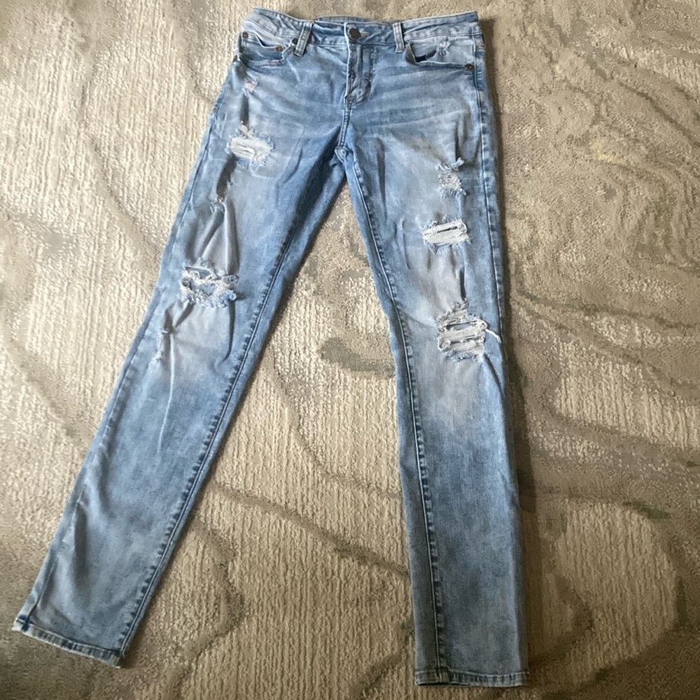 Distressed Light Blue Denim Jeans